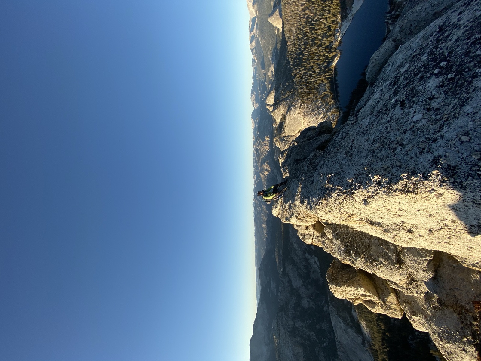Standing on a granite outcrop above the lake