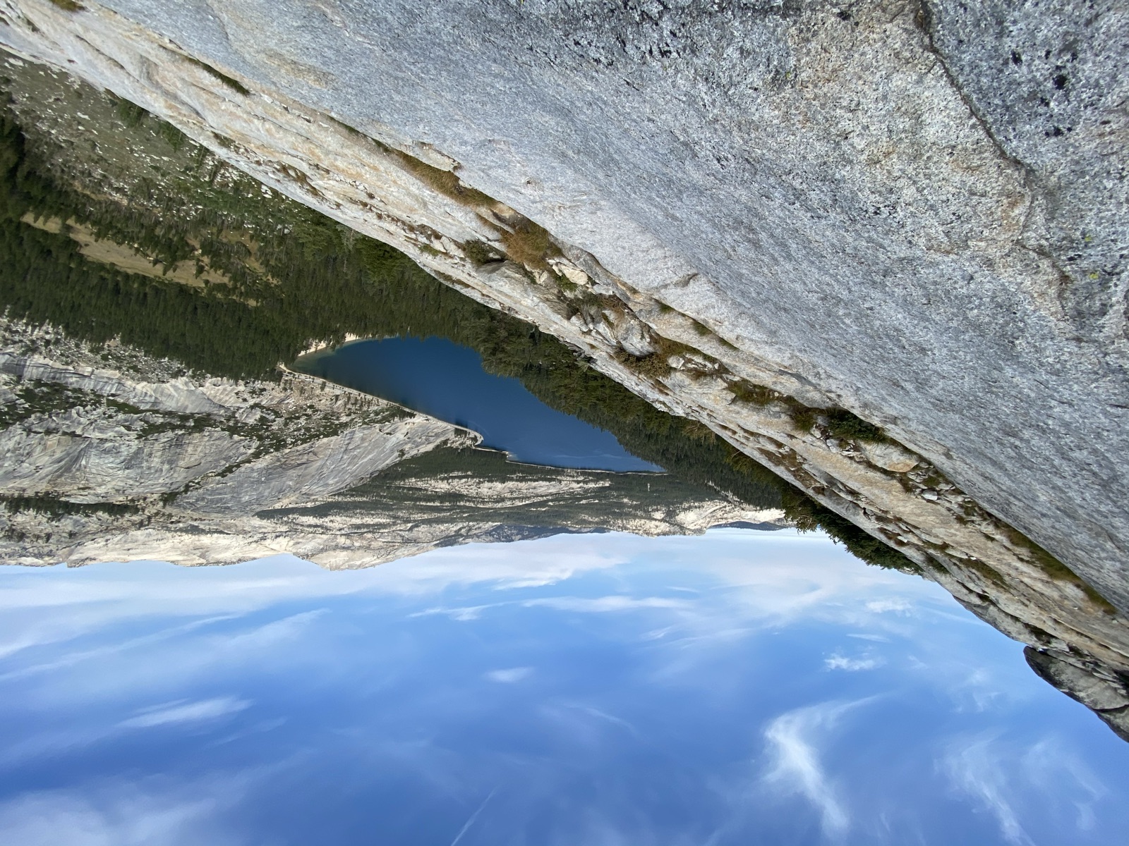 Looking down the granite slab toward Tenaya Lake