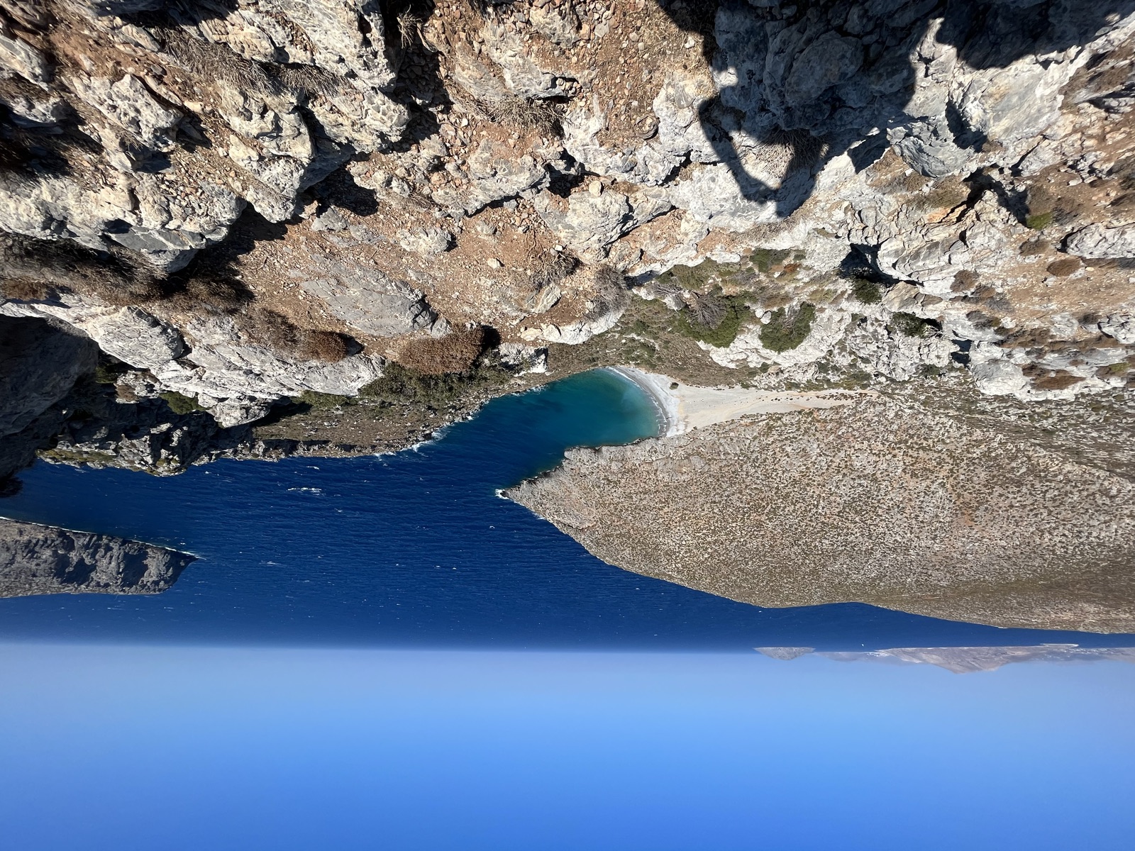 Telendos across the water, a steep limestone island rising out of the Aegean
